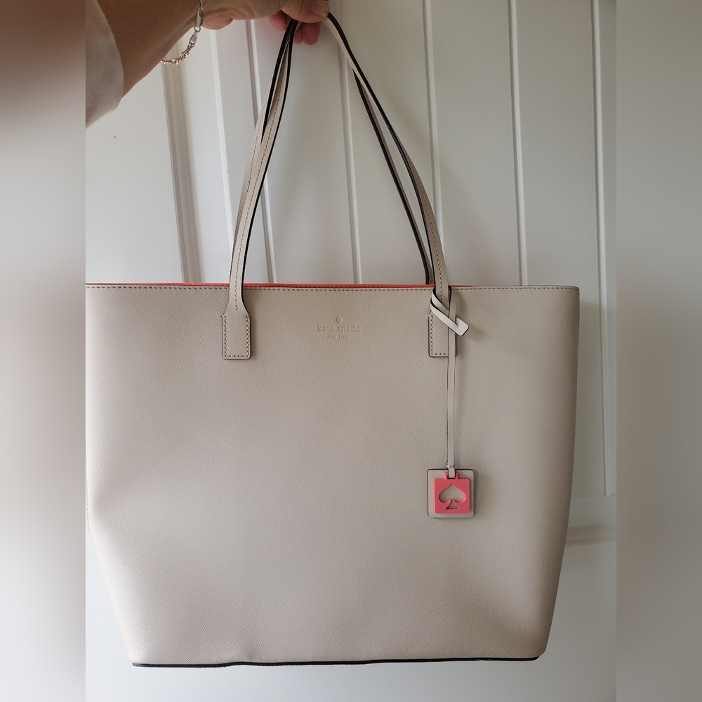 Kate Spade Abbey Street Karla Cream Tote With Hot Pink logo hangtag/ interior
